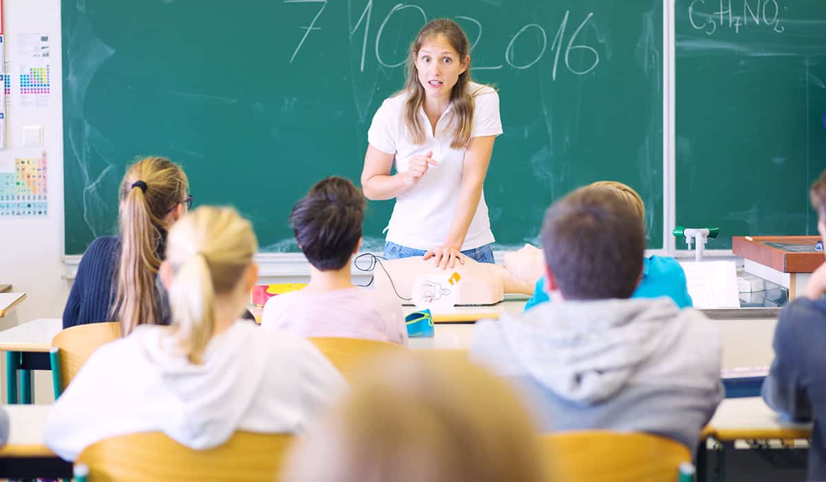 An image of someone teaching CPR