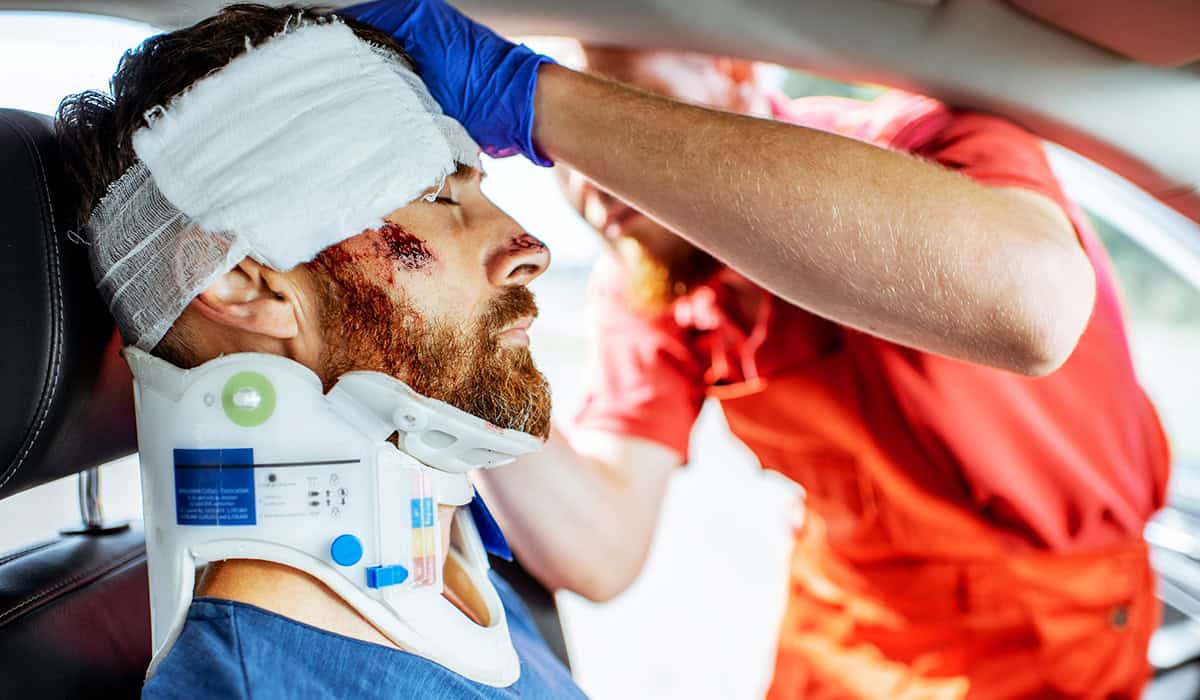 An image of someone being treated for a head injury