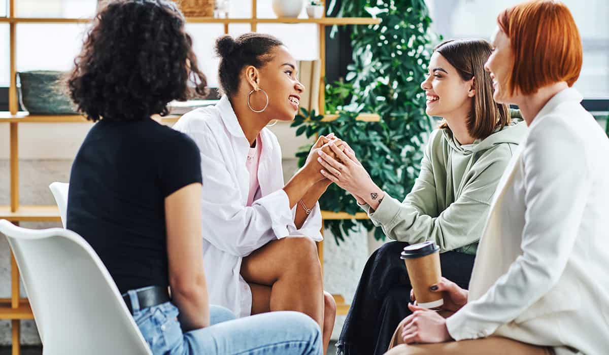 An image of a group talking with each other